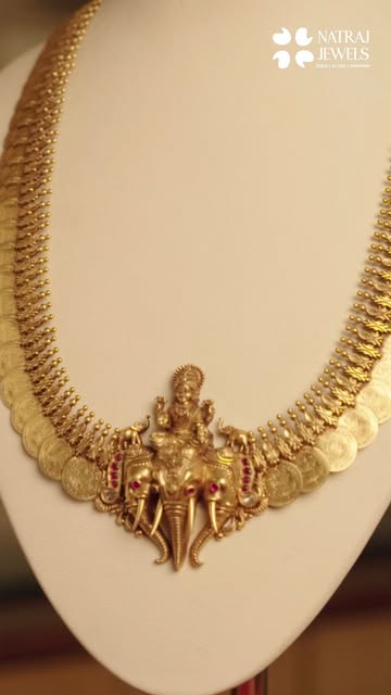 Gold kasu mala with an elephant pendant